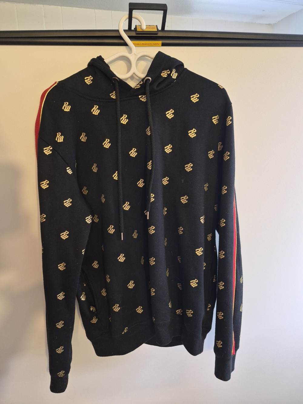 Rocawear Black Hoodie with Gold Logo and Red Stripe Accent